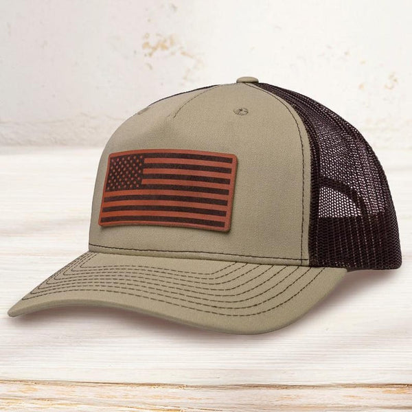 Custom leather patch trucker hat with engraved logo
