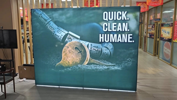 Custom LED backlit backdrop with logo - illuminated trade show display - PromoMogul